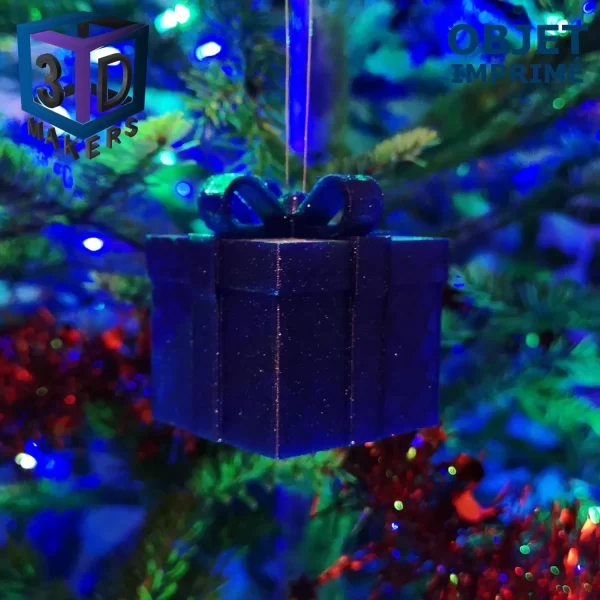 Boule de Noël cadeau bleu pailleté